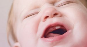 première poussée dentaire bébé